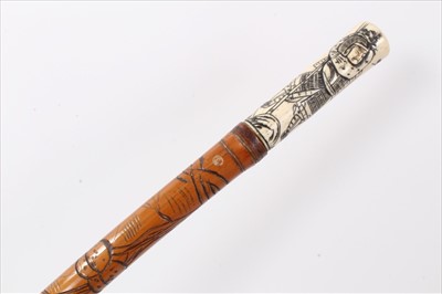 Lot 3703 - Late 19th/early 20th century Japanese Bamboo walking stick with carved pokerwork decoration and Bone handle with carved scrimshaw style decoration of a Samurai Warrior, 87cm overall length