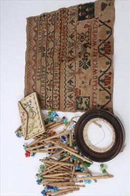 Lot 3751 - Regency silk purse, George III sampler, collection of turned silk bobbins