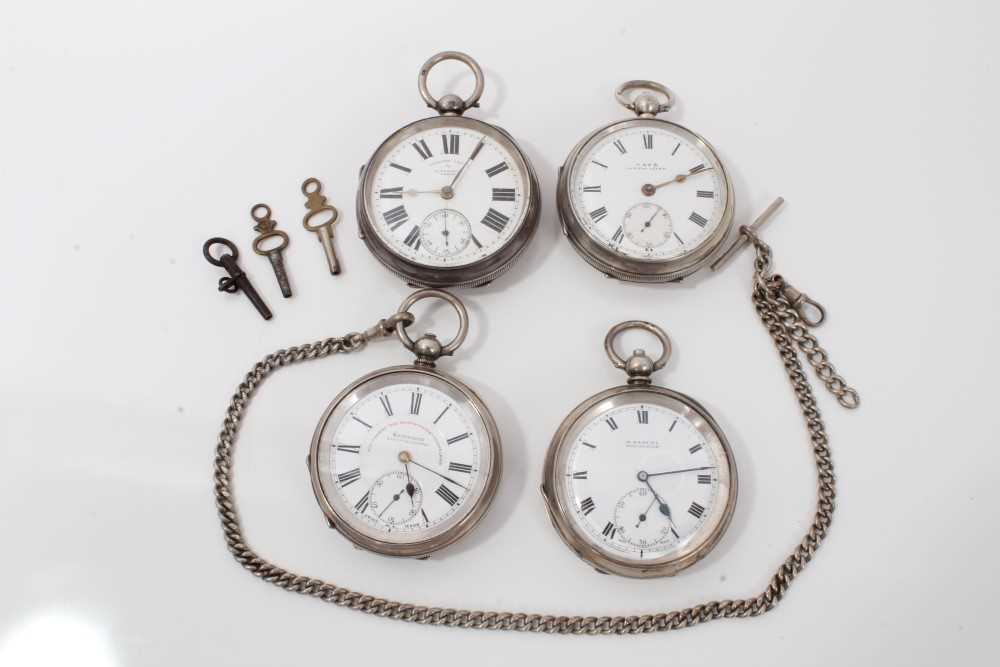 Lot 3394 - Four late Victorian and Edwardian silver open face keys wind pocket watches , over with silver chain (5)