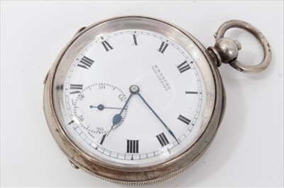 Lot 3394 - Four late Victorian and Edwardian silver open face keys wind pocket watches , over with silver chain (5)