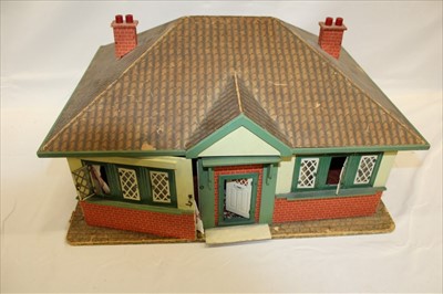 Lot 2890 - Doll House 1930's Semi-detached Bungalow with a large accumulation of furniture, accessories and dolls, mixed periods.