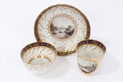 Lot 8 - Fine 18th century Chamberlains Worcester tea trio, with spiral moulding, decorated with the standard pattern 60, each piece painted en grisaille  with different titled views - Pembroke, Worcester a...