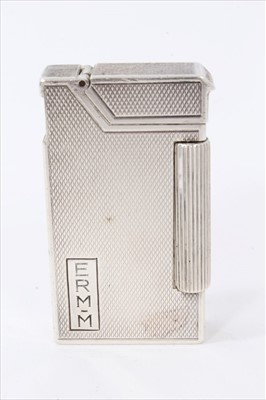 Lot 3409 - Dunhill silver cigarette lighter with 1953 Coronation hallmarks and engine turned decoration, maker’s mark for Alfred Dunhill, London 1953. Height 57mm