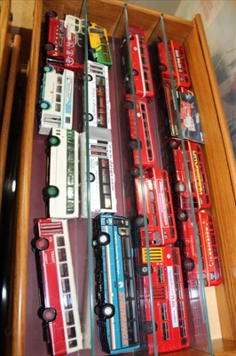 Lot 2769 - Diecast selection of mostly unboxed Buses, housed in eight wooden wall cabinets plus others