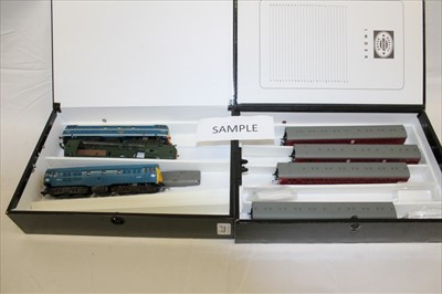 Lot 2770 - Railway Hornby 00 gauge selection of unboxed  carriages, brake van, Gresley Blood & Custard coaches etc all housed in purpose built box files (8 boxes)