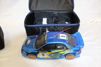 Lot 2904 - Remote control Subaru Racing Car with Techniplus controller both in carrying cases.