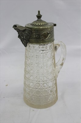 Lot 3825 - Cut glass claret jug with plated mounts and mask decoration