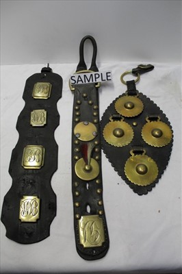 Lot 1868 - Good collection of antique martingales, approximately 20 leather straps hung with various decorative brasses