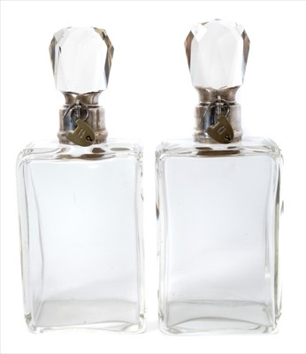 Lot 209 - Pair of Edwardian silver mounted spirit decanters with cut glass stoppers