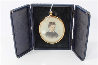 Lot 3831 - Edwardian oval miniature portrait in gilt frame and blue leather easel back case