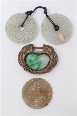 Lot 3481 - Old Chinese carved jade/green hardstone buckle with silver gilt mounts, 72mm, and three Chinese hardstone panels, 55-60mm diameter