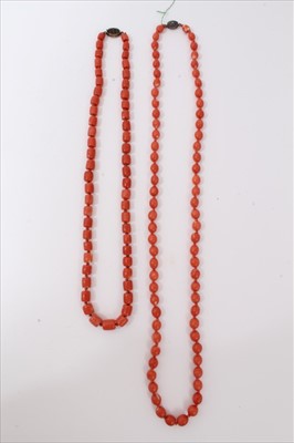 Lot 3484 - Two old Chinese coral necklaces with silver clasps