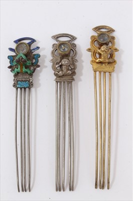 Lot 3487 - Three old Chinese hair ornaments, each with a compass and frog. 95mm