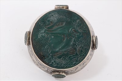 Lot 3489 - Unusual silver and intaglio double ring, the large circular intaglio greenstone plaque measuring approximately 51mm diameter, in neillo work mount with further inset green stone panels, engraved se...