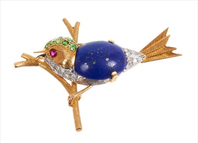 Lot 354 - 18 ct yellow and white gold bird brooch with cabochon lapis lazuli body, demantoid garnet set head, diamonds in breast and tail and ruby eyes by E Wolfe & Co 8.4gms