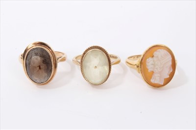 Lot 3194 - Two gold 9ct quartz cocktail rings and gold cameo ring (3)