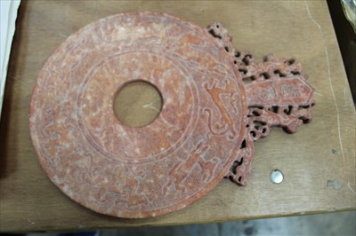 Lot 3878 - Chinese carved stone Bi disc of archaic circular form 25cm x 33.5cm