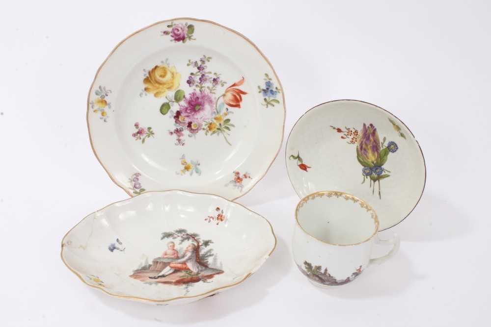 Lot 36 - 18th century Meissen cup, finely painted with figural scenes, a Ludwigsburg porcelain dish of similar period, painted with a figural scene and flowers, a further Ludwigsburg saucer painted with flo...