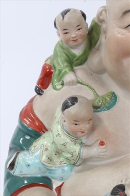 Lot 42 - 20th century Chinese porcelain figure of Buddha, with five boys playing around him, impressed mark to base, 26cm height