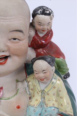 Lot 42 - 20th century Chinese porcelain figure of Buddha, with five boys playing around him, impressed mark to base, 26cm height