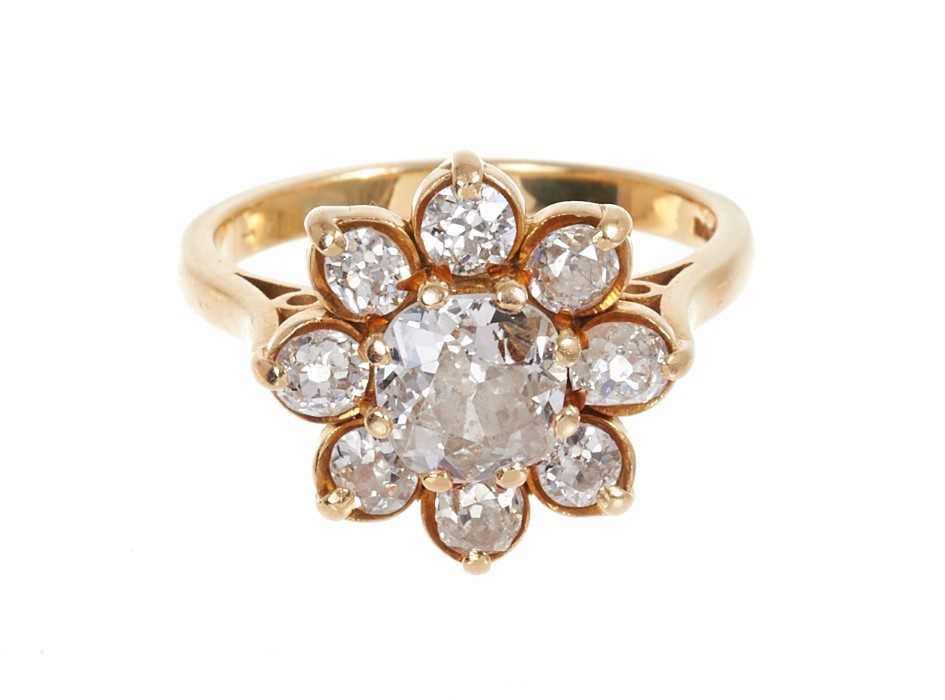 Lot 357 - Diamond cluster ring with a flower head