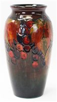 Lot 2001 - 1930s Moorcroft pottery flambé glazed vase...