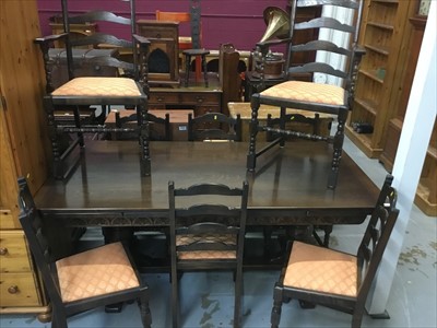 Lot 800 - Oak dining table and eight chairs