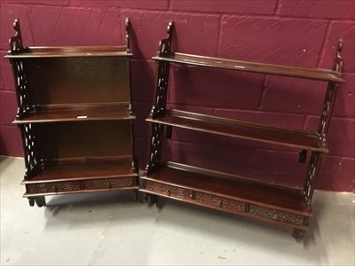 Lot 803 - Two 19th century-style wall hanging shelves with two drawers