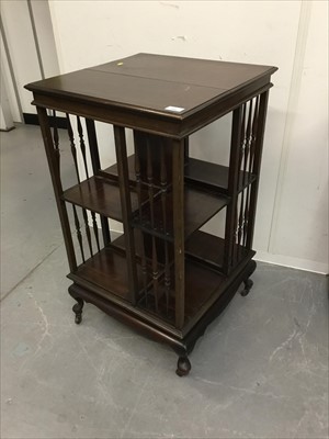 Lot 804 - An Edwardian mahogany revolving bookcase, on cabriole legs