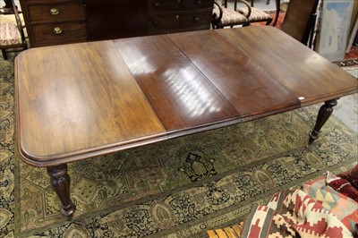 Lot 1353 - Mid-19th century mahogany extending dining table, two leaves