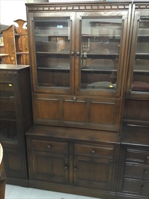 Lot 844 - Ercol-style  two height drinks display cabinet