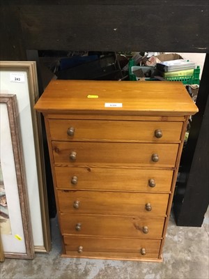 Lot 698 - Miniature pine chest of six drawers containing various costume jewellery