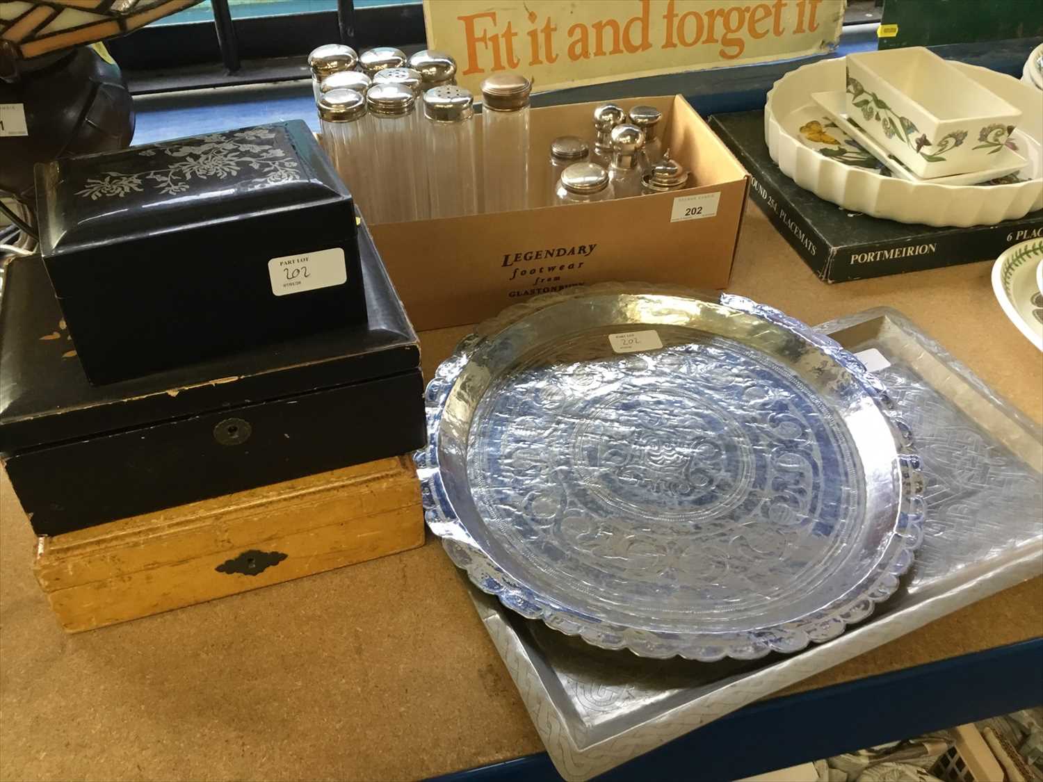 Lot 202 - Collection of silver lidded glass flasks, two Indian silver trays and group of antique boxes