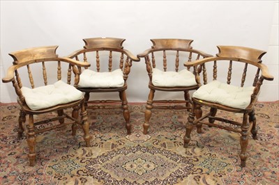 Lot 1292 - Two pairs of early 20th century captains chairs