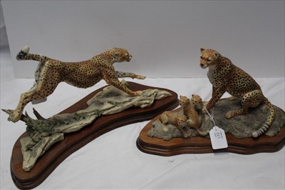 Lot 889 - Two large Border Fine Arts figures of cheetahs, on original wooden bases, the larger figure measuring 37cm across