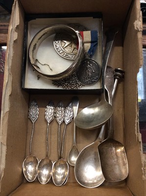 Lot 681 - Group of silver spoons, silver bangle, medallions