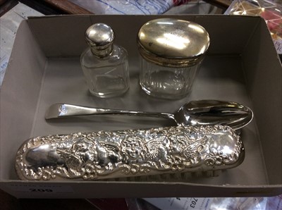 Lot 697 - Silver spoon, two silver topped bottles, and a...