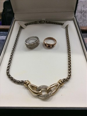 Lot 682 - Two gold rings and necklace