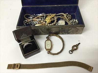 Lot 654 - 1930s diamond three stone ring in platinum setting on 9ct gold shank in Bakelite box, 1920s ladies 9ct gold cased wristwatch on plated bracelet, vintage costume jewellery and bijouterie in box