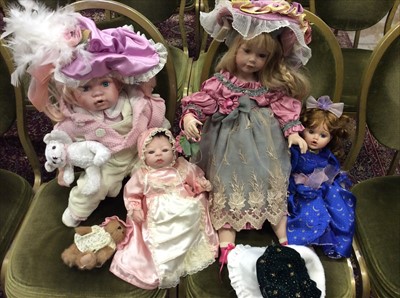 Lot 59 - Three boxes containing a quantity of assorted dolls
