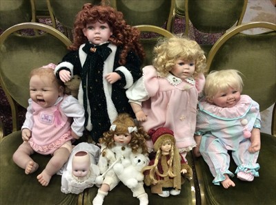 Lot 59 - Three boxes containing a quantity of assorted dolls