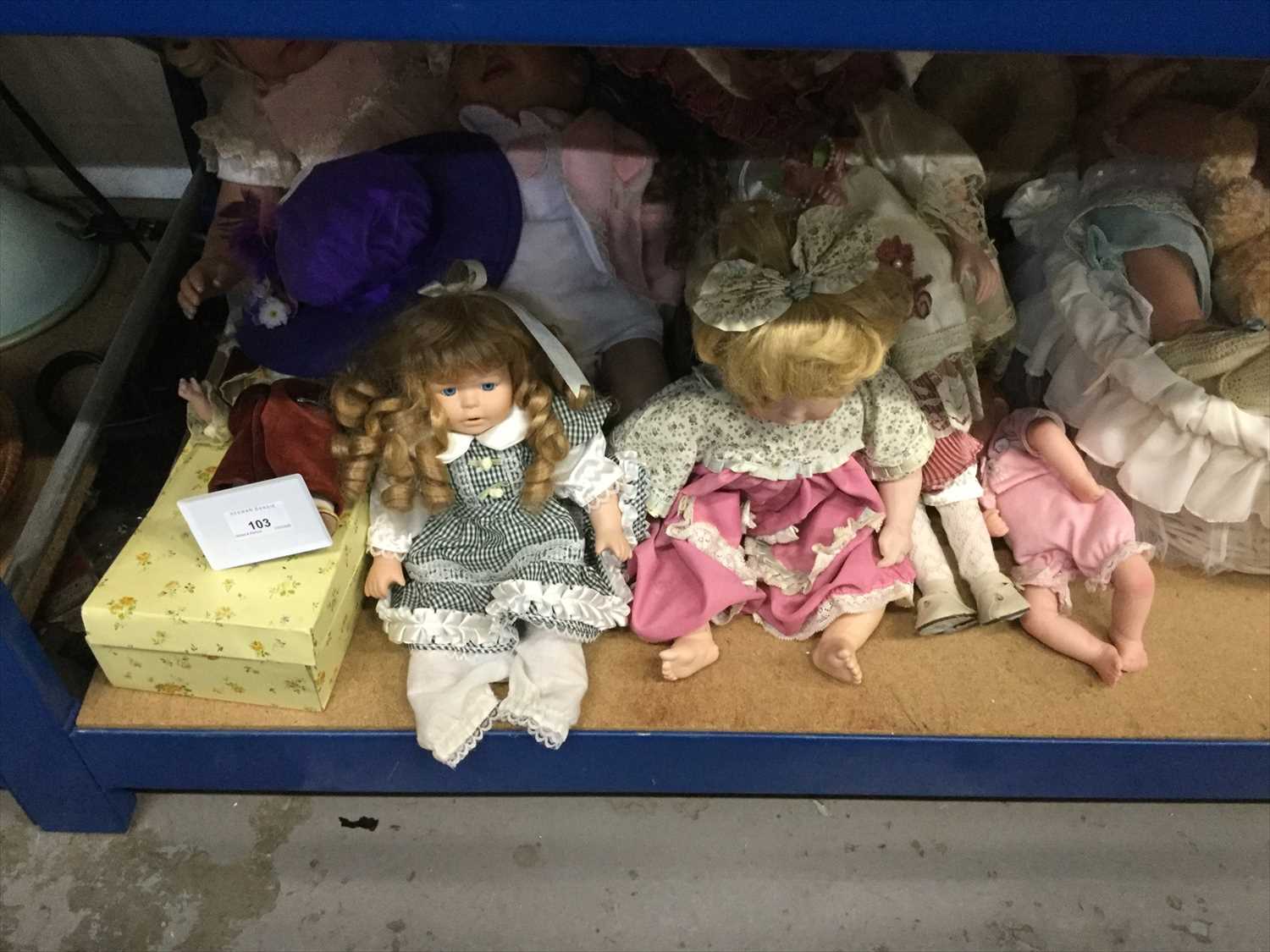 Lot 103 - Dolls- one shelf containing a large quantity of assorted dolls