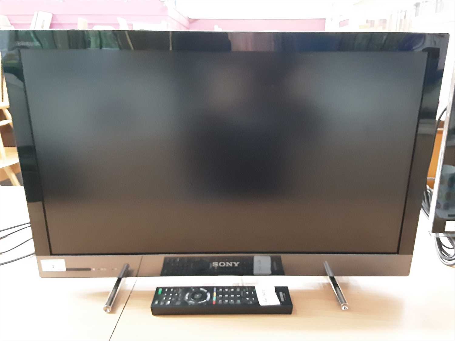 Lot 2 - Sony TV  model number KDL-26EX320 with remote control