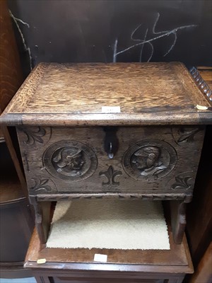 Lot 847 - Carved oak box/stool with hinged lid