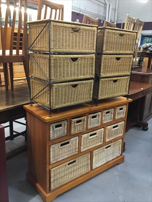 Lot 949 - Contempory nest of storage rattan woven drawers and two nests of rattan drawers (3)