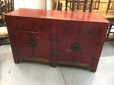 Lot 834 - Old Chinese red stained sideboard with drawers and cupboards with brass mounts