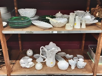 Lot 524 - Spode, Wedgwood and other cabbage leaf dishes, jugs, etc (2 shelves)