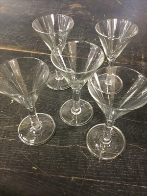 Lot 136 - Set of five 18th century style wine glasses, with trumpet bowl and teardrop stem on folded foot