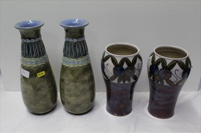 Lot 874 - Two pairs of Royal Doulton Stoneware vases (4)