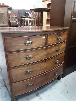 Lot 874 - 19th century mahogany bowfront chest of two short and three long graduated drawers